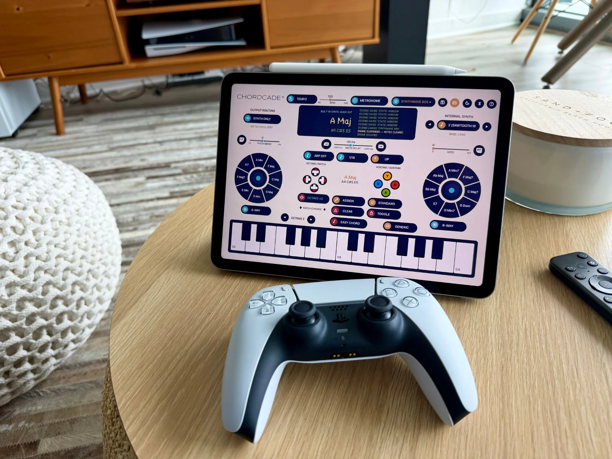 Chordcade running on an M3 iPad propped on a side table, with a PlayStation DualSense controller in front of it