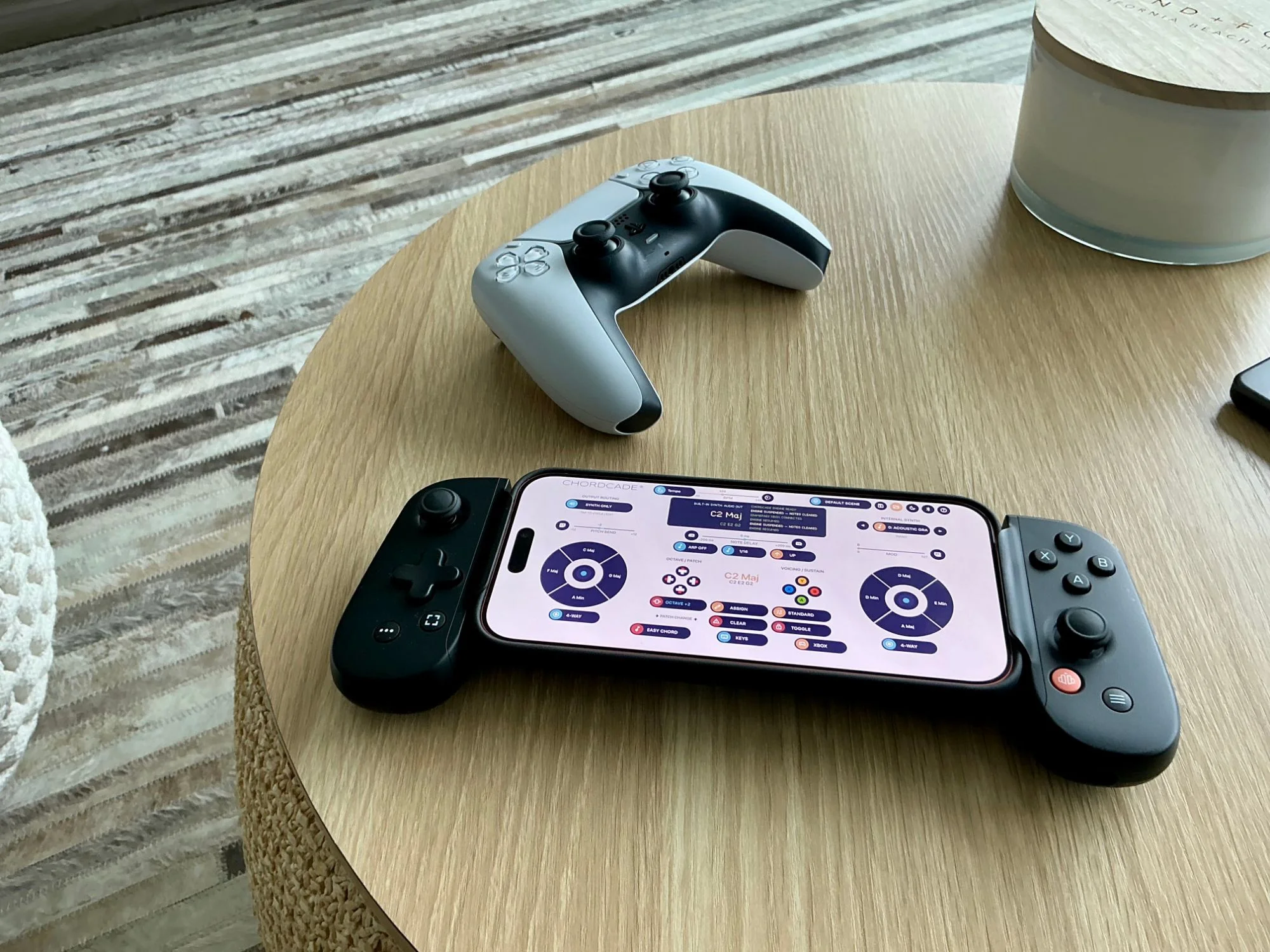 Chordcade running on an iPhone 17 Pro Max in a Backbone controller, with a PlayStation DualSense controller behind it